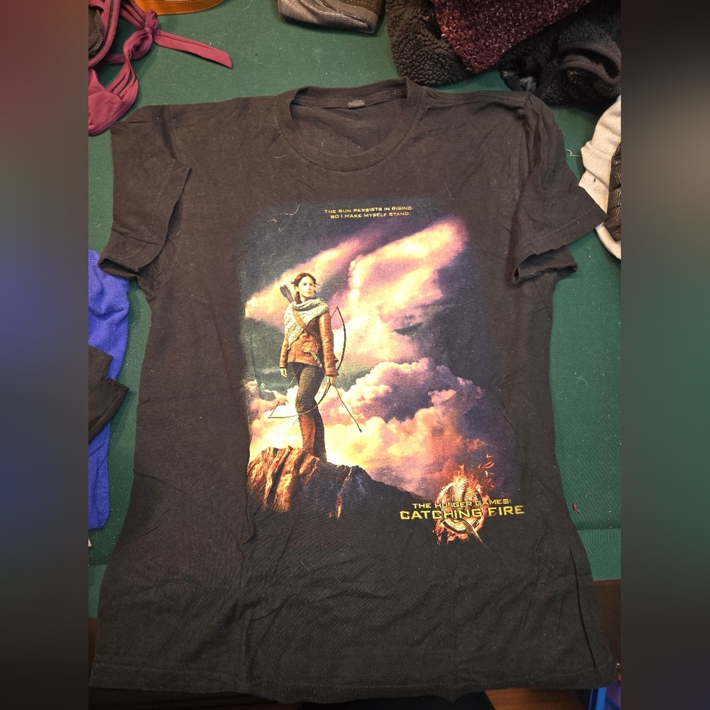 Hunger games catching fire shirt.